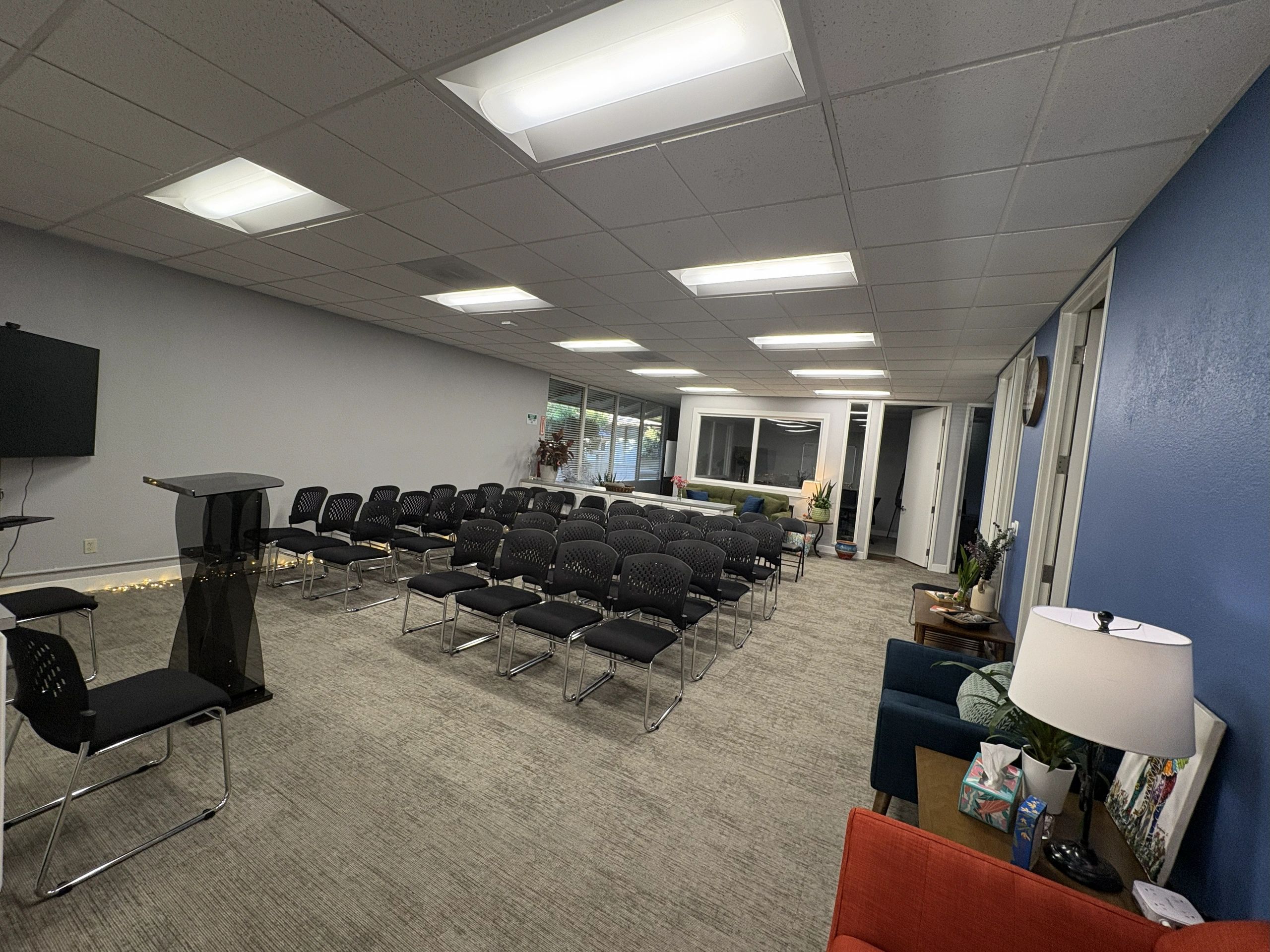 Training and workshop room with whiteboard and bookshelves at Consulting, E.T.C. Sacramento