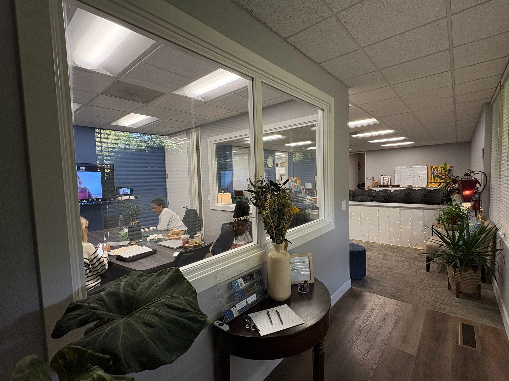 Glass-walled private office and reception area at Consulting, E.T.C. Sacramento coworking space